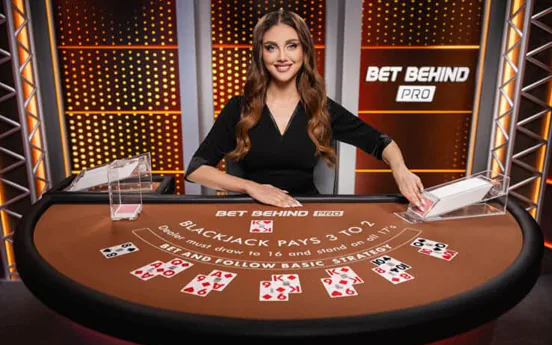 Live blackjack with bet behind
